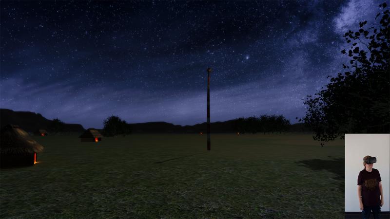 Visitor using VR headset to glimpse at site as it appeared 1000 years ago.